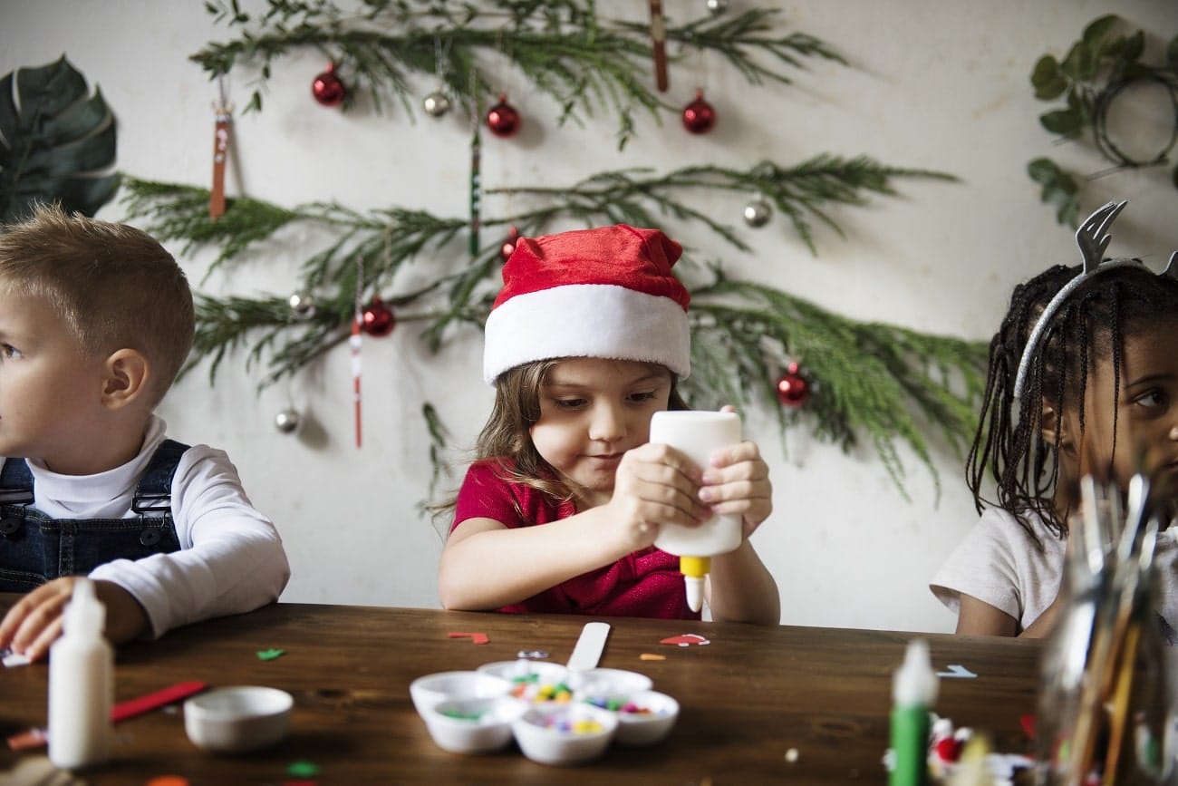 School children make Christmas decorations