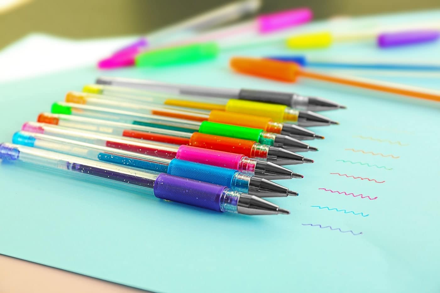 coloured pens on a desk