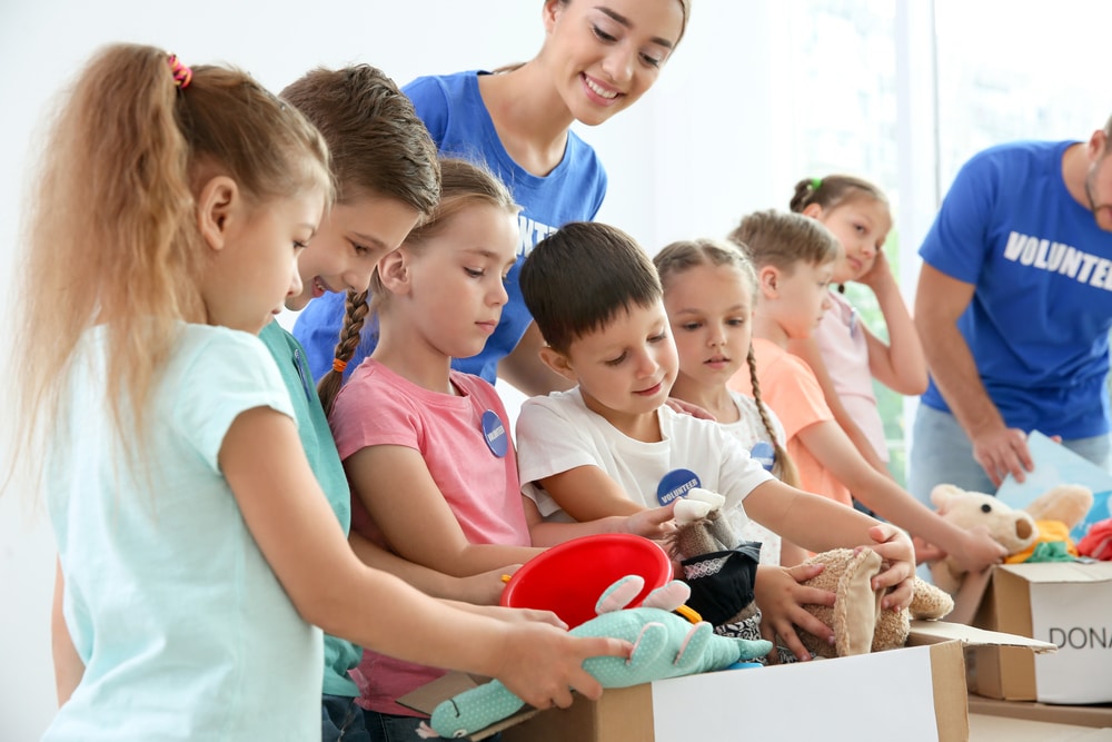 Children donating toys