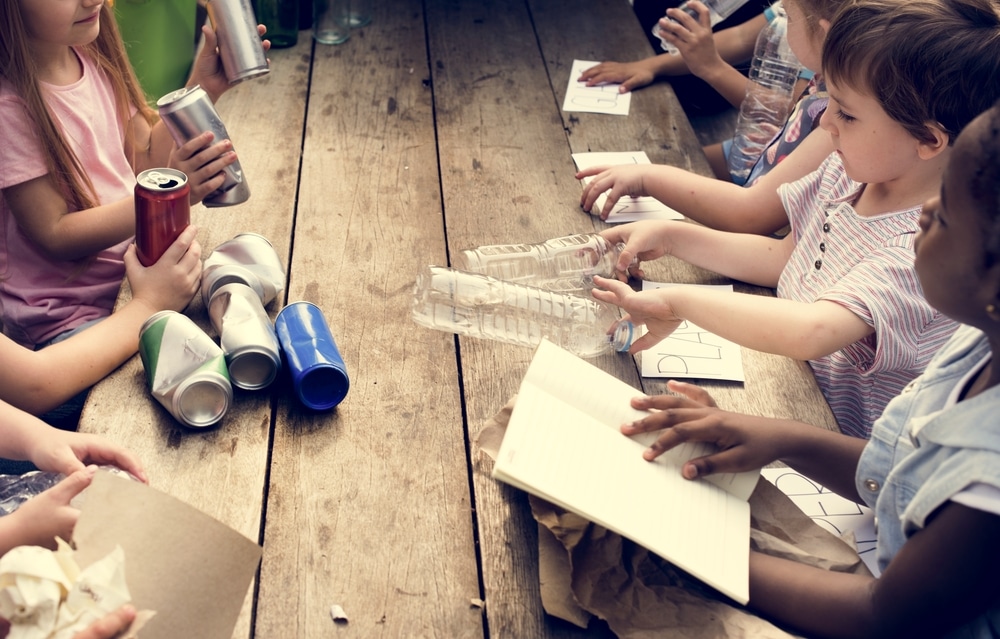 children creating with recycling