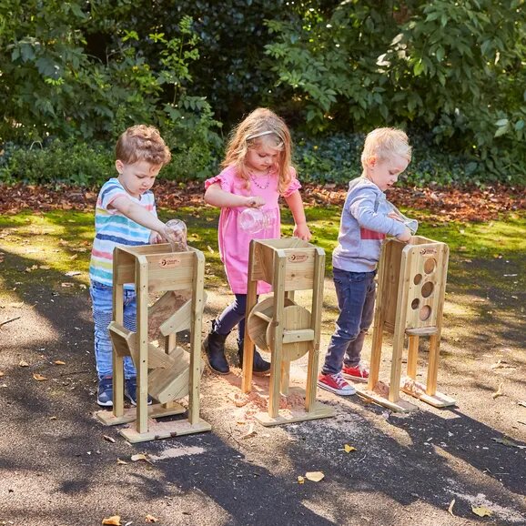 benefits of water play- 3 children playing with wooden water features