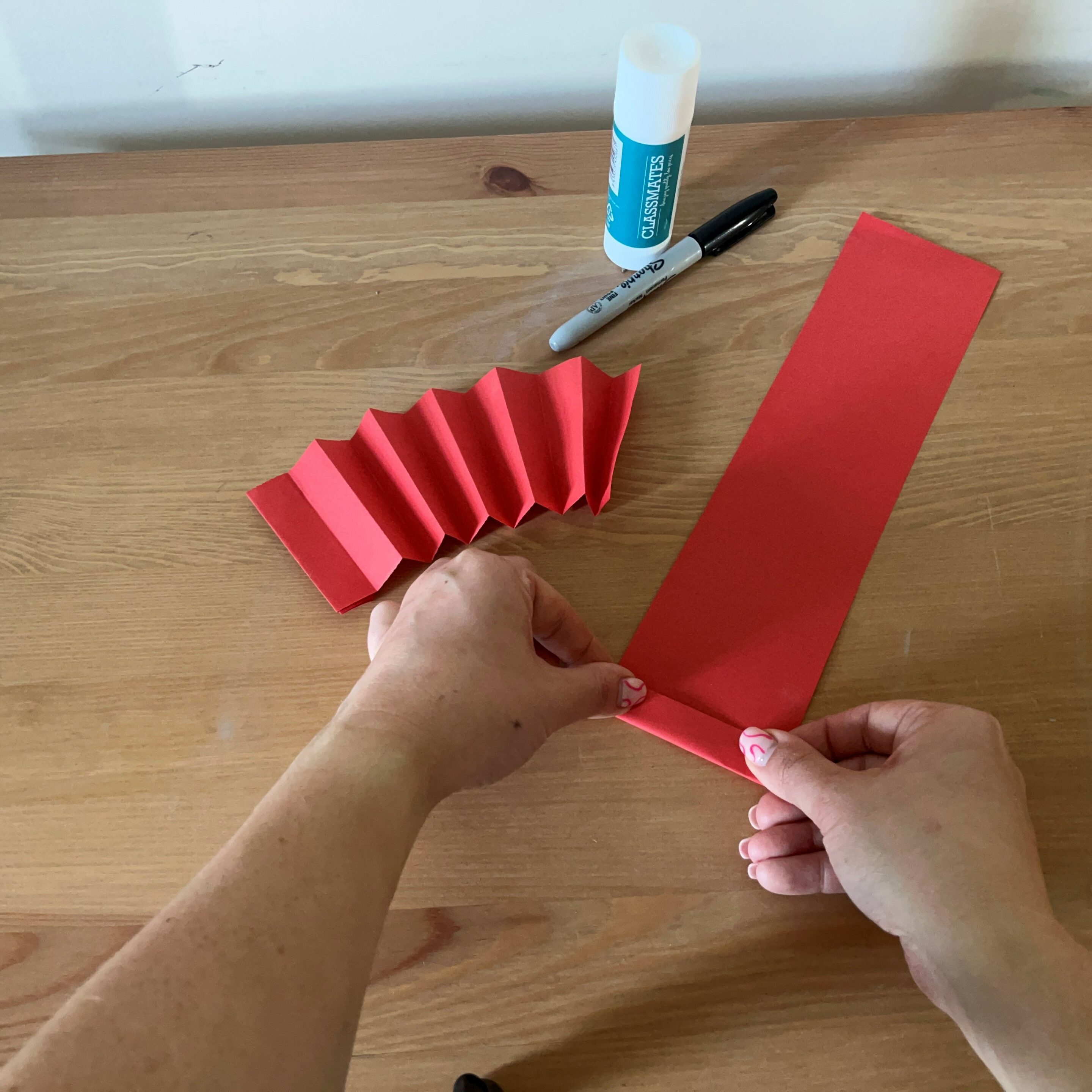 concertina fold of card