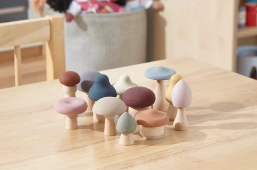 sustainable silicone and wooden mushrooms on table