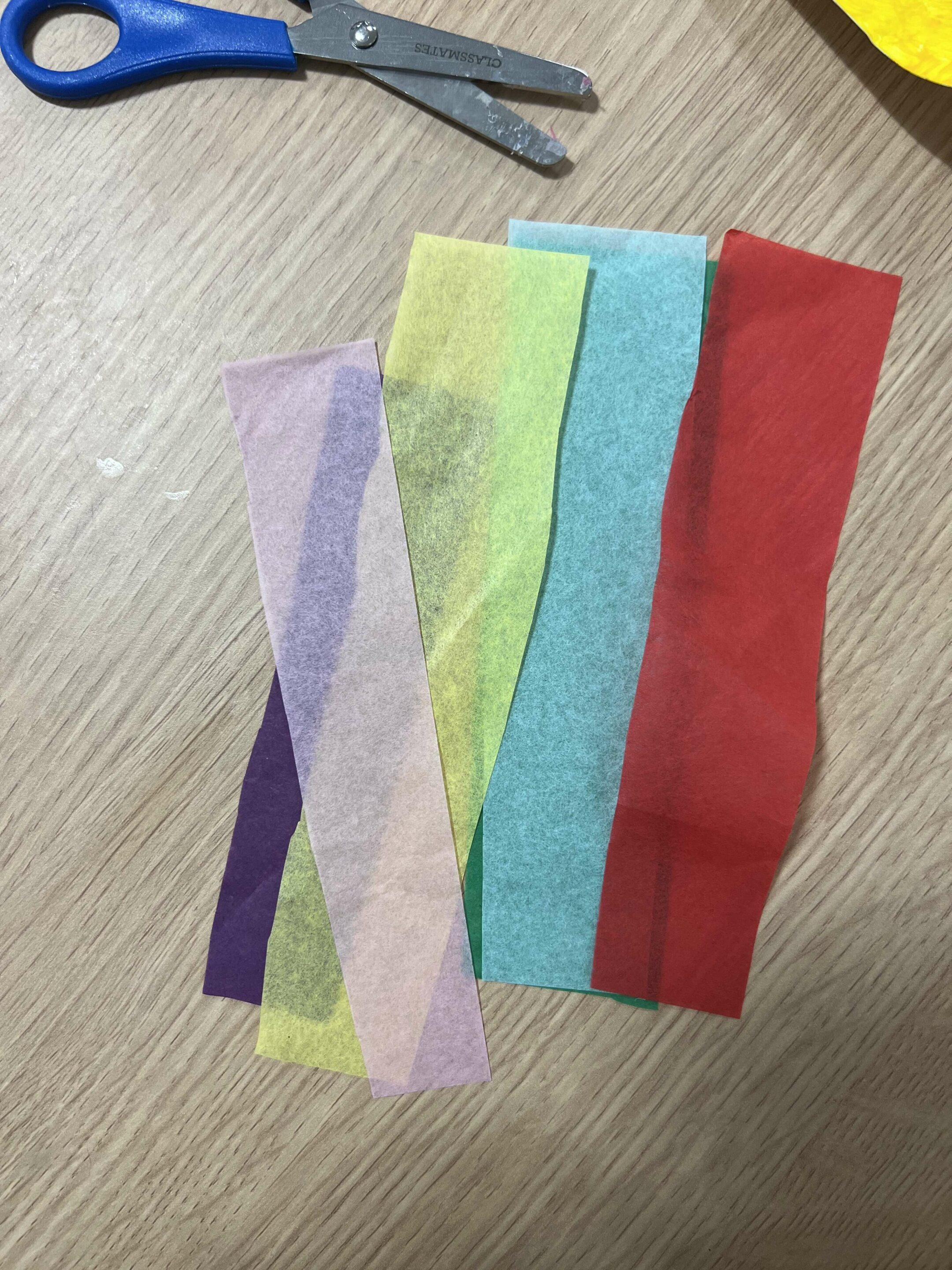 coloured strips of tissue paper