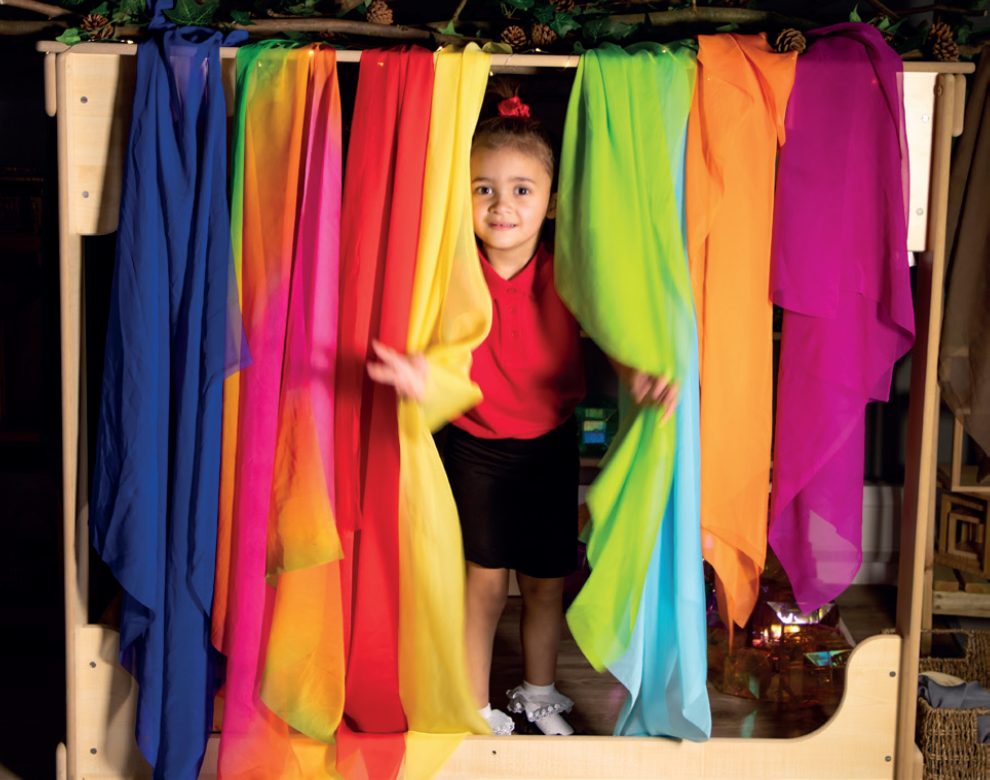 Girl, colourful fabrics