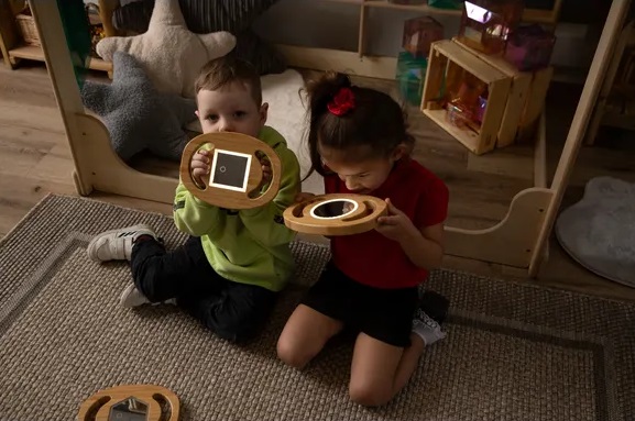 Children reading in the dark